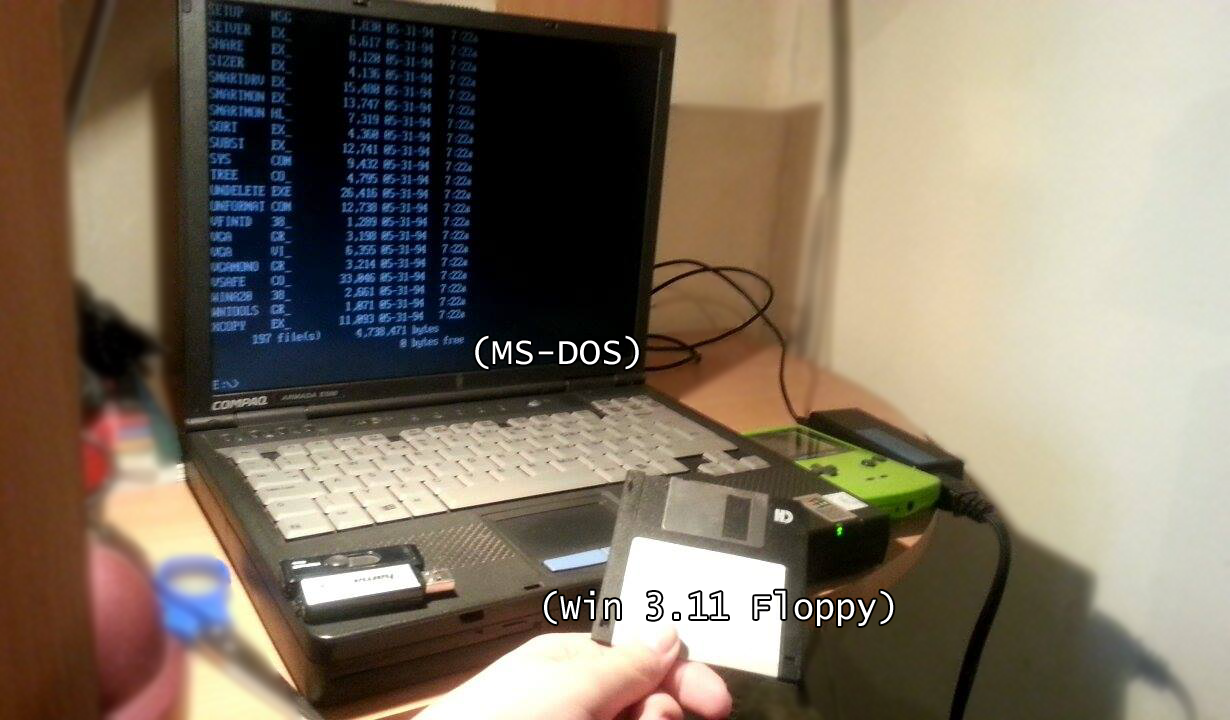Picture of COMPAQ laptop running MS-DOS and a Windows 3.11 floppy disk